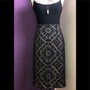 CHICOs Black and nude cutout midi pencil skirt with back zipper.